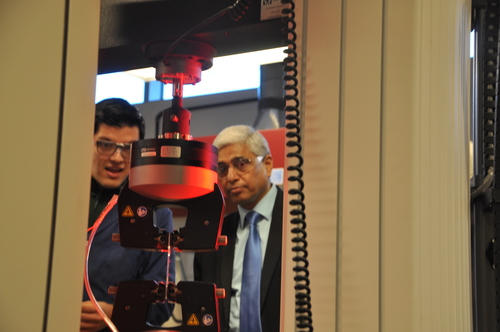 High Commissioner of India having equipment demonstrated to him.